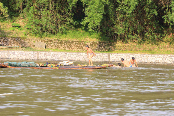 Young swimmers on the Li River